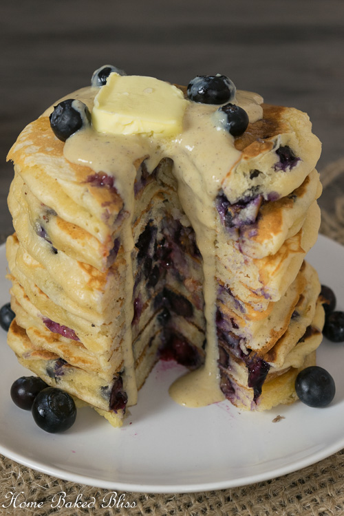 Blueberry Pancakes drizzled with a generous amount of homemade Vanilla Sauce
