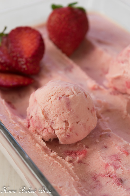 A scoop of homemade strawberry ice cream