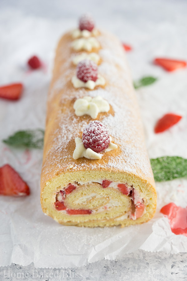 strawberry roll with berry sauce, strawberry roll, strawberry roll recipe, Swiss roll with strawberries recipe, Swiss roll with strawberries, berry Swiss roll, berry Swiss roll recipe, jelly roll recipe, strawberry jelly roll recipe, strawberry jelly roll, strawberry Swiss roll, strawberry Swiss roll recipe, best strawberry roll, best strawberry roll recipe, how to make strawberry roll, how to make Swiss roll, how to make jelly roll
