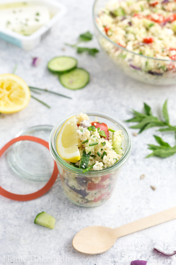 Couscous salad packaged in a Weck jar for a portable picnic lunch.