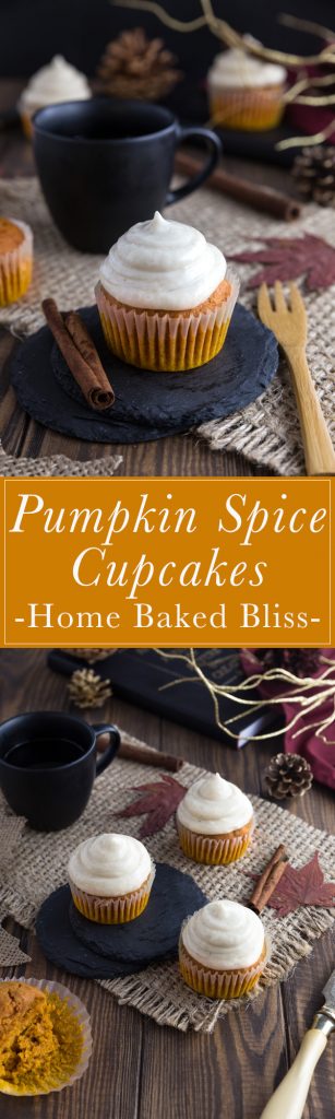 A pumpkin spice cupcake with cinnamon frosting next to a wooden fork.