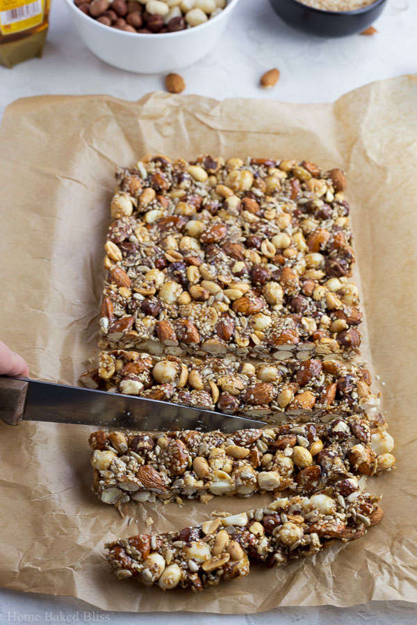 Cutting the honey nut bars with a sharp knife