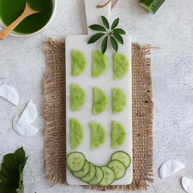 DIY Cooling Cucumber Eye Pads on a white tray