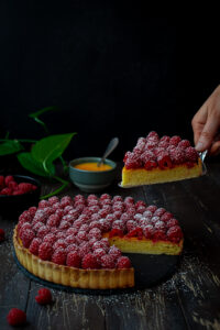 A slice of Raspberry Frangipane Tart