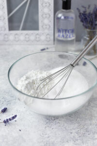 Combining the dry ingredients for the bath bombs