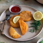 Kohlrabi Schnitzel with Cucumber Potato Salad served with ketchup