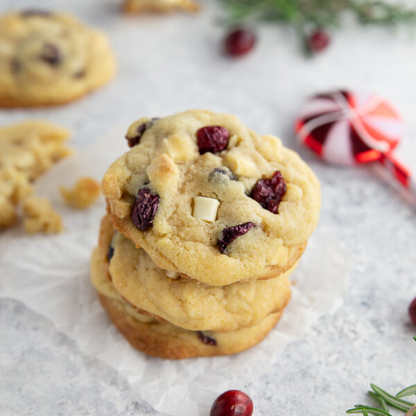 A big stack of cranberry white chocolate chip cookies.