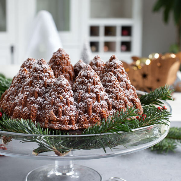 Gingerbread bundt cake with Christmas decor background